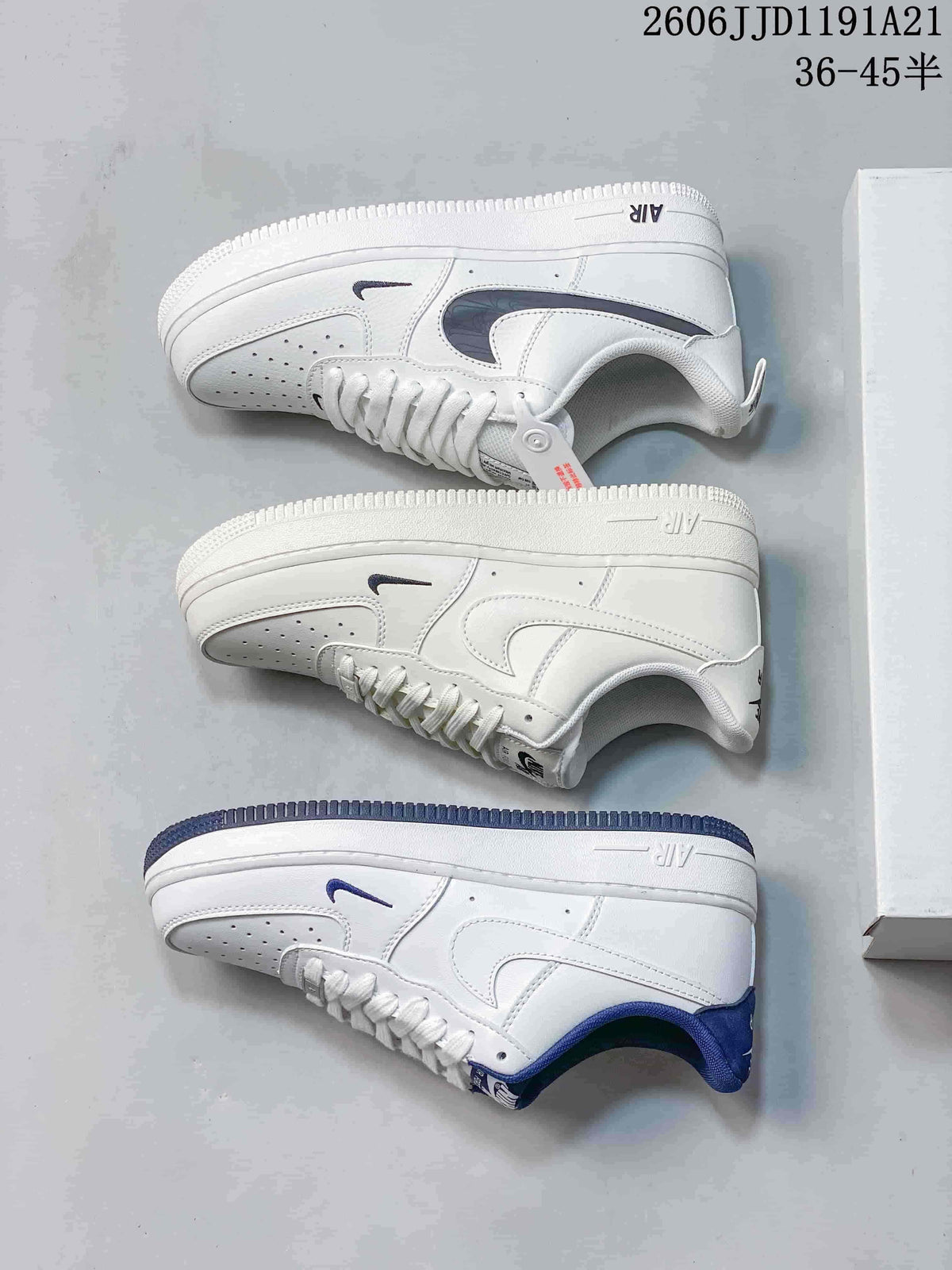 Three white low-top sneaker color variations shown from the side, including blue and dark accents.