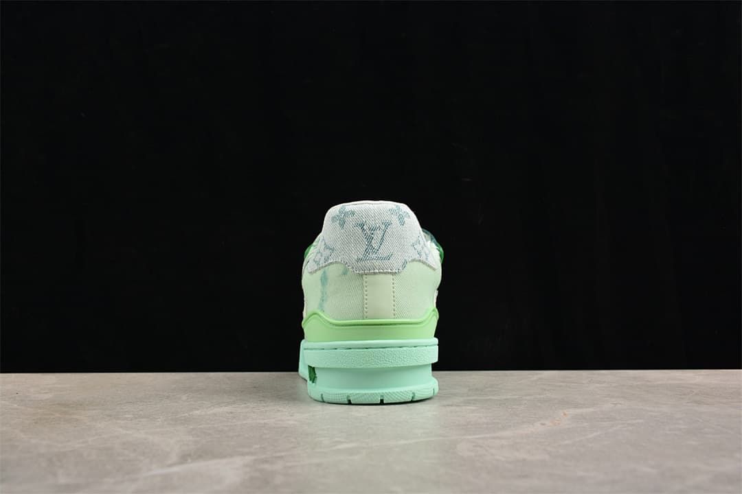 Rear view showing the sneaker heel and layered mint-green sole.