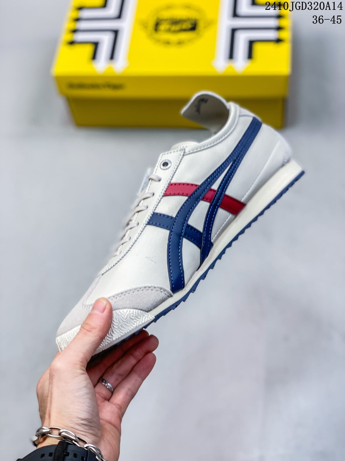 Side view of a white low-top sneaker with navy blue and red stripes