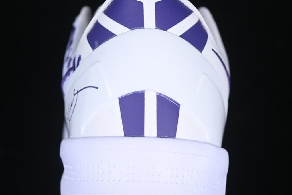 Rear view showing purple heel accents
