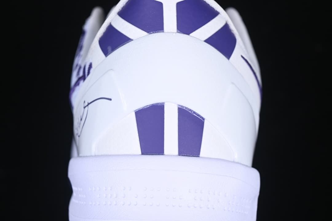 Rear view showing purple heel accents