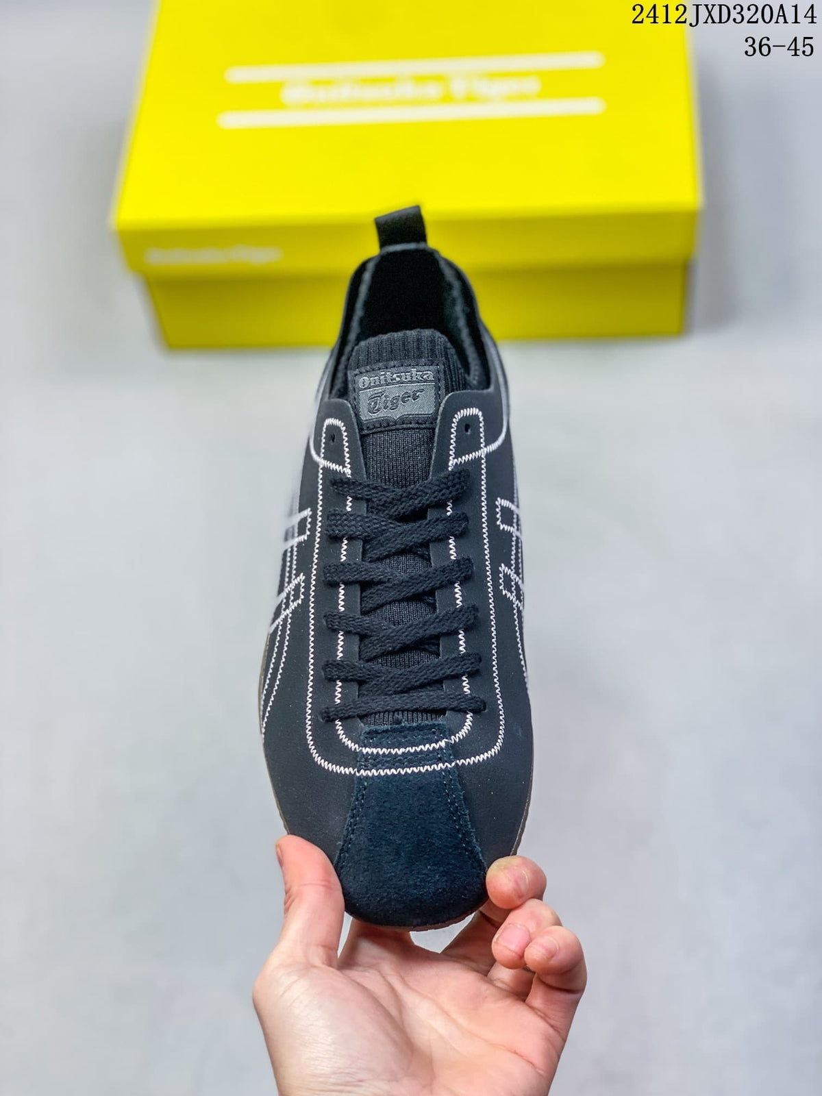 Top view of a navy SCLAW sneaker with black laces and a ribbed tongue label.