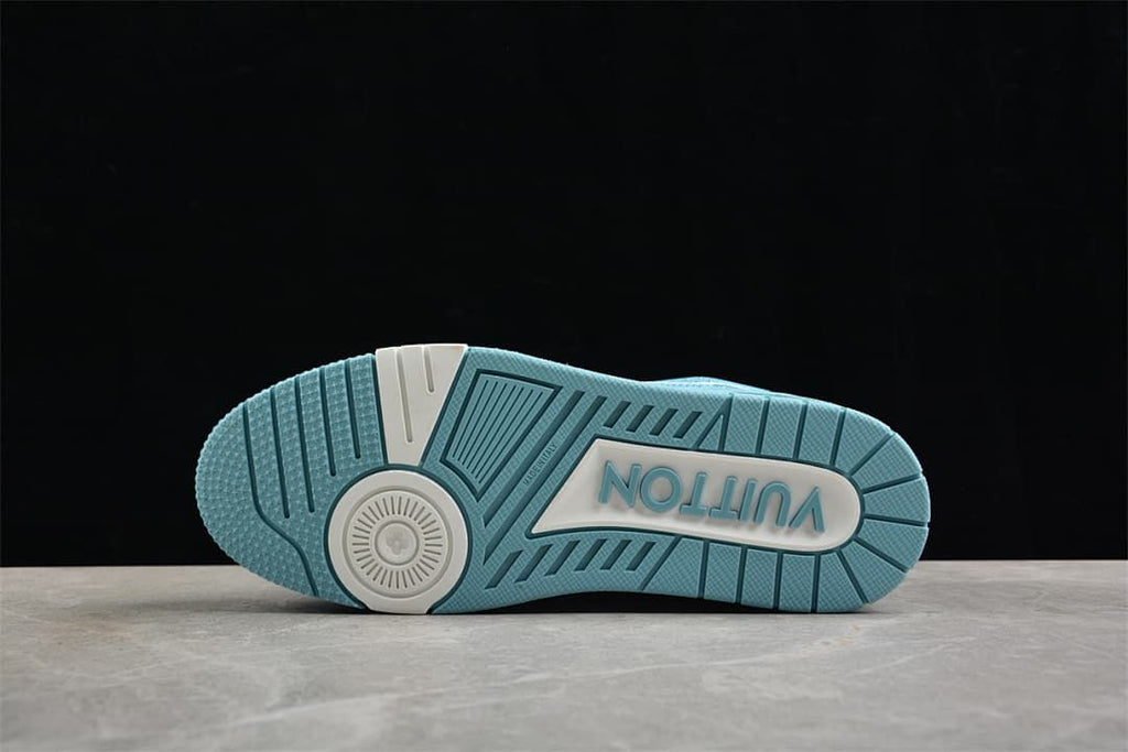 Blue patterned outsole with white sections and raised lettering