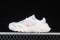Side profile of the white adidas XLG Storm Edge sneaker with pink and gray accents