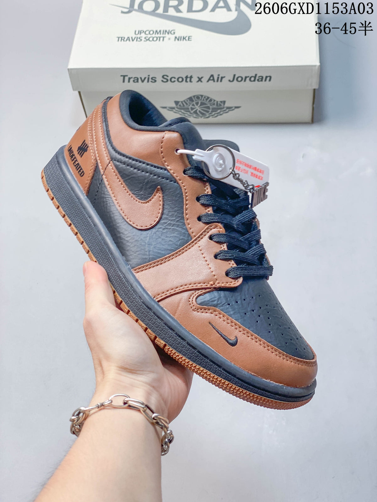 Angled view showing contrasting panels and side swoosh
