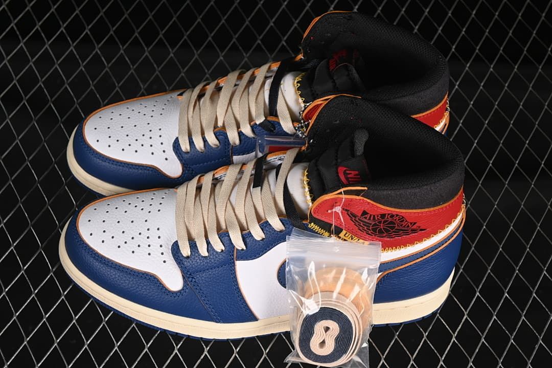 Pair of white, blue, and red high-top sneakers with an extra lace set pictured