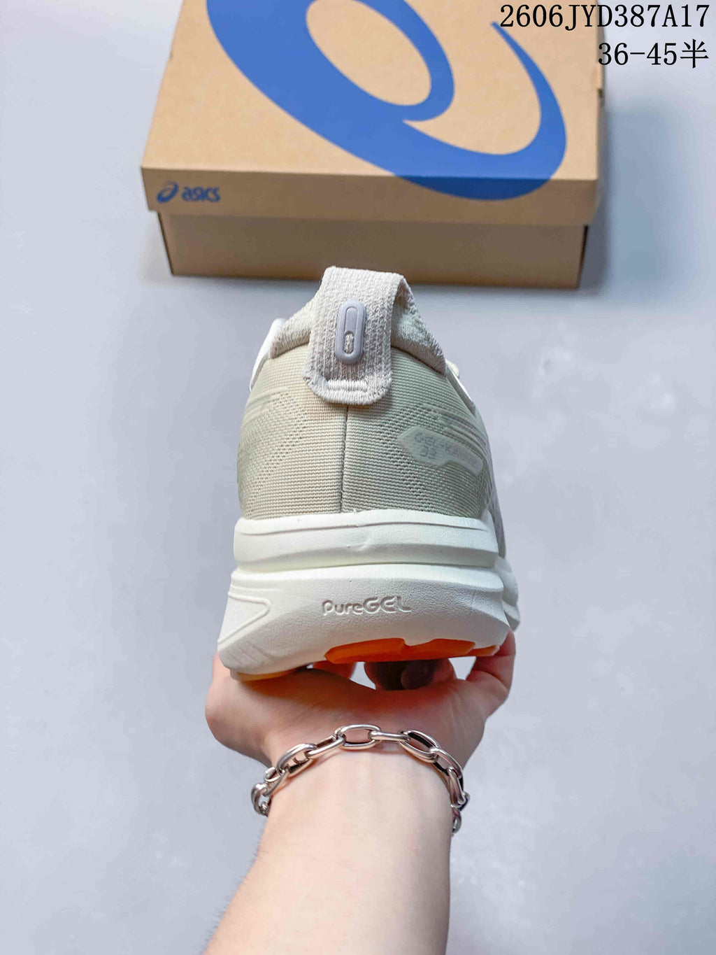 Rear view of the shoe with a heel pull tab and PureGEL marking on the midsole