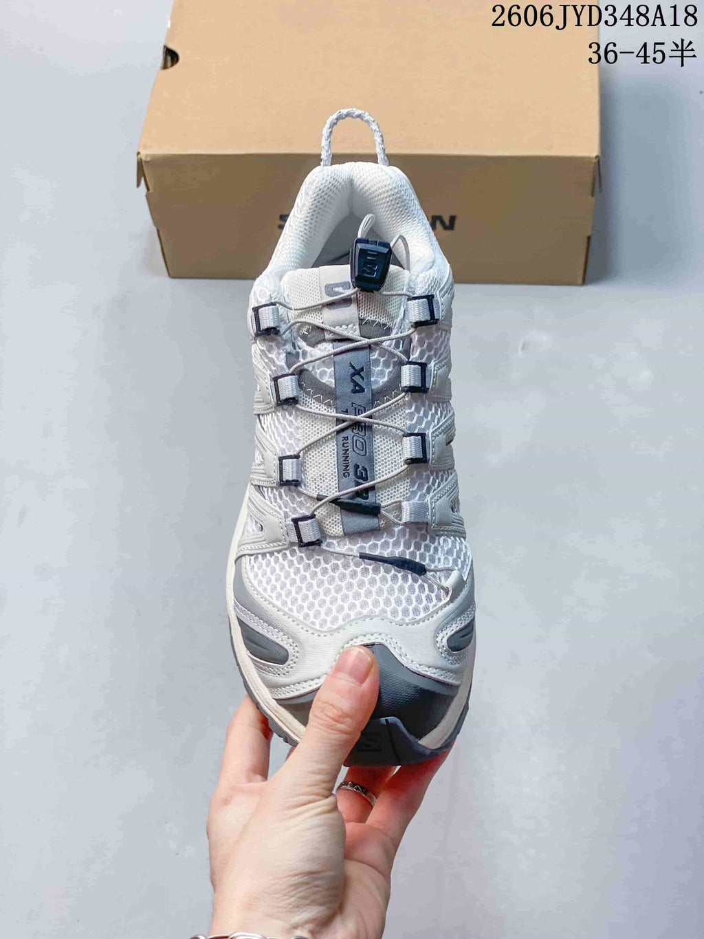 Front view of the shoe showing its cord-style closure and toe area.