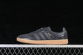Side view of dark grey Adidas Samba OG sneakers with tonal stripes and a gum-colored sole
