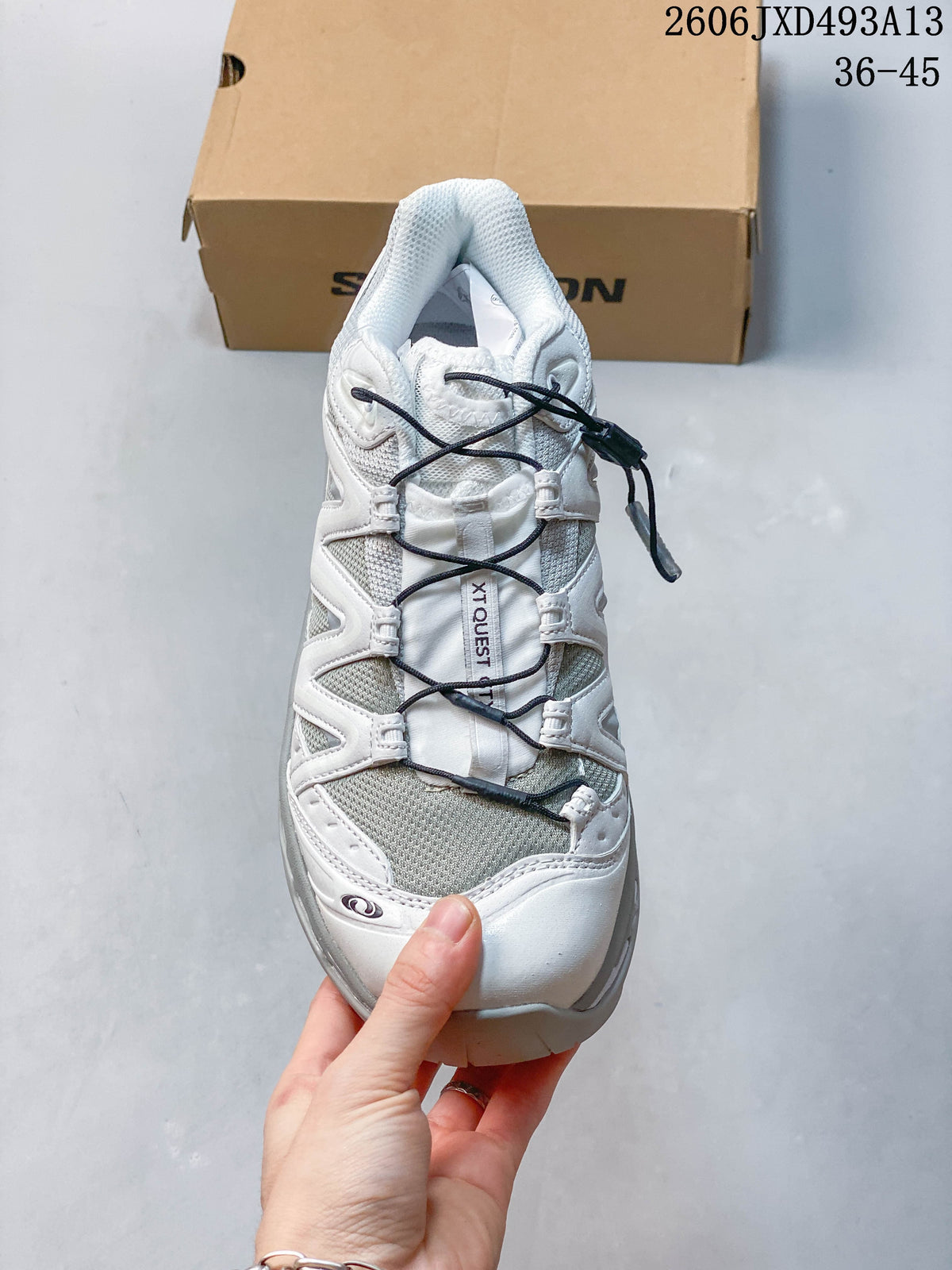 Top view of the sneaker showing its mesh-look panels and quick-lace closure.