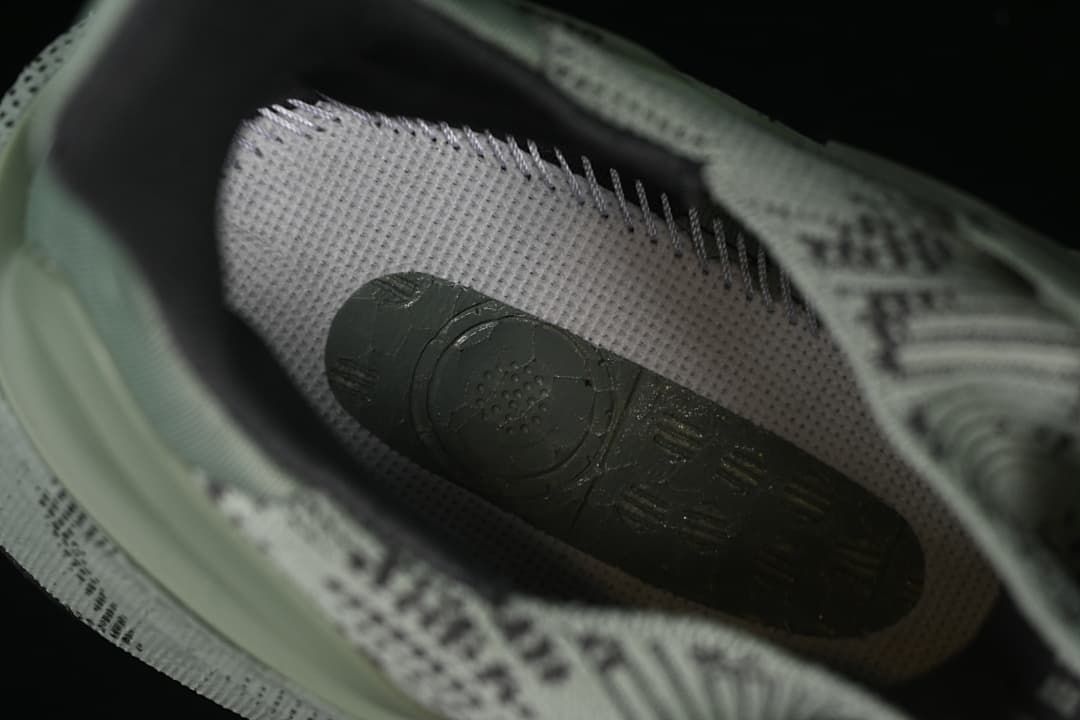 Close-up inside the shoe showing the insole and patterned upper