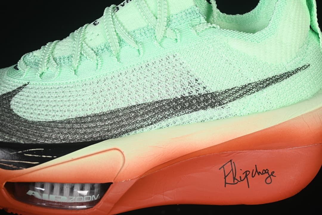 Close-up of the dark Swoosh, textured upper and visible Zoom Air unit.