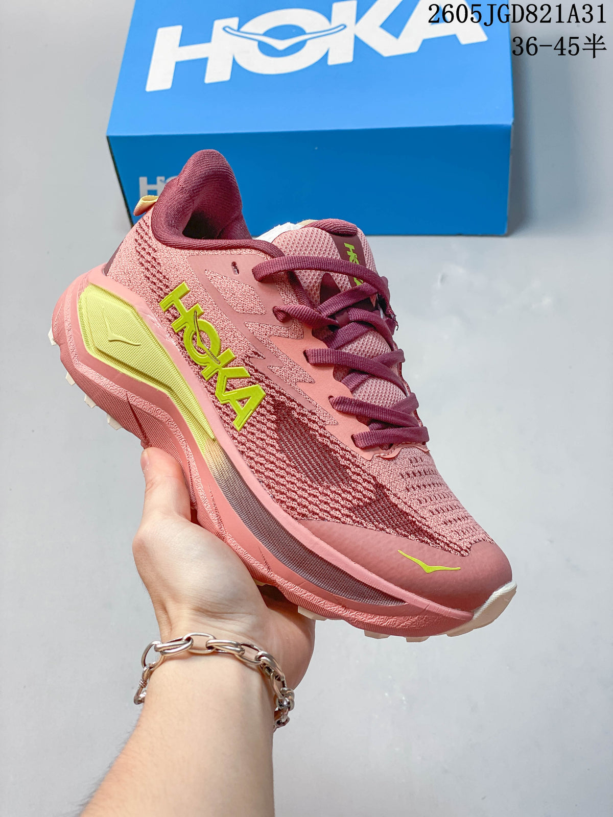 Pink HOKA Challenger 8 mesh running shoe with burgundy accents and a yellow-green heel detail