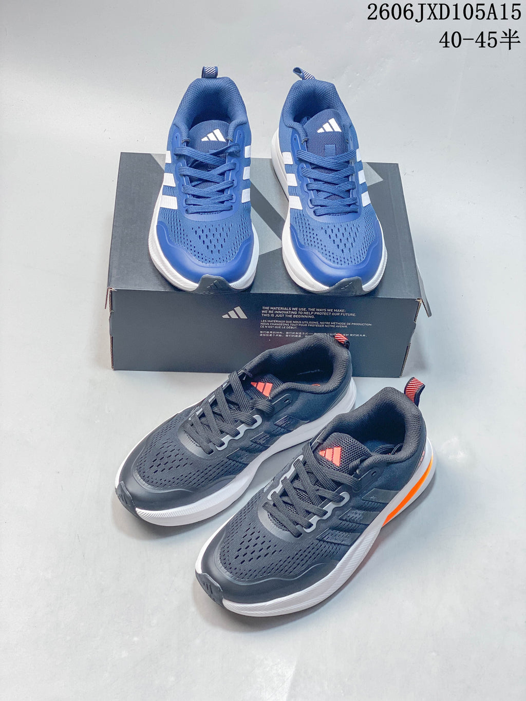 Blue and charcoal-gray Adidas Ultrabounce shoes shown together
