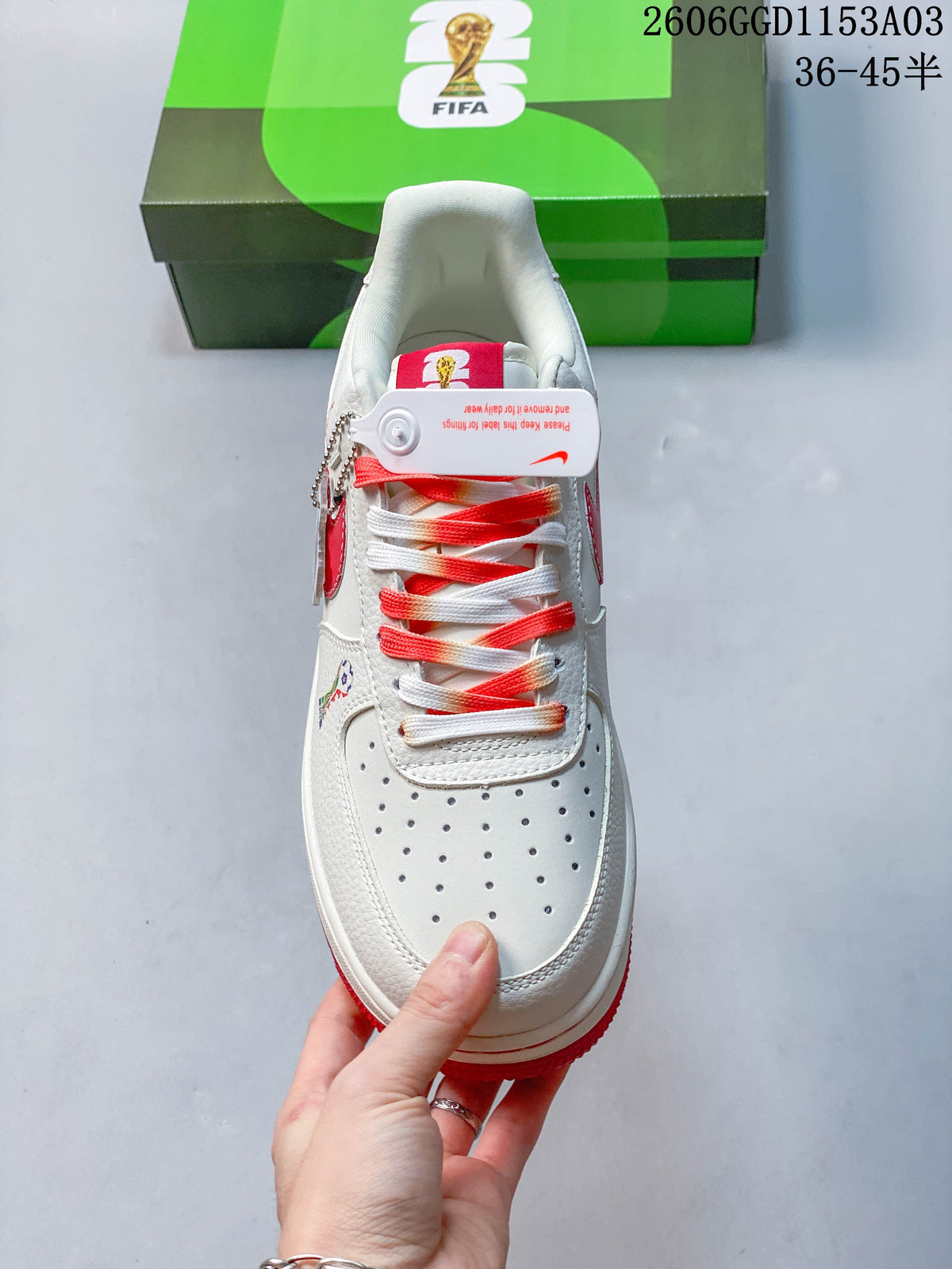 Top view showing perforated toe, padded collar, and red-and-white laces.