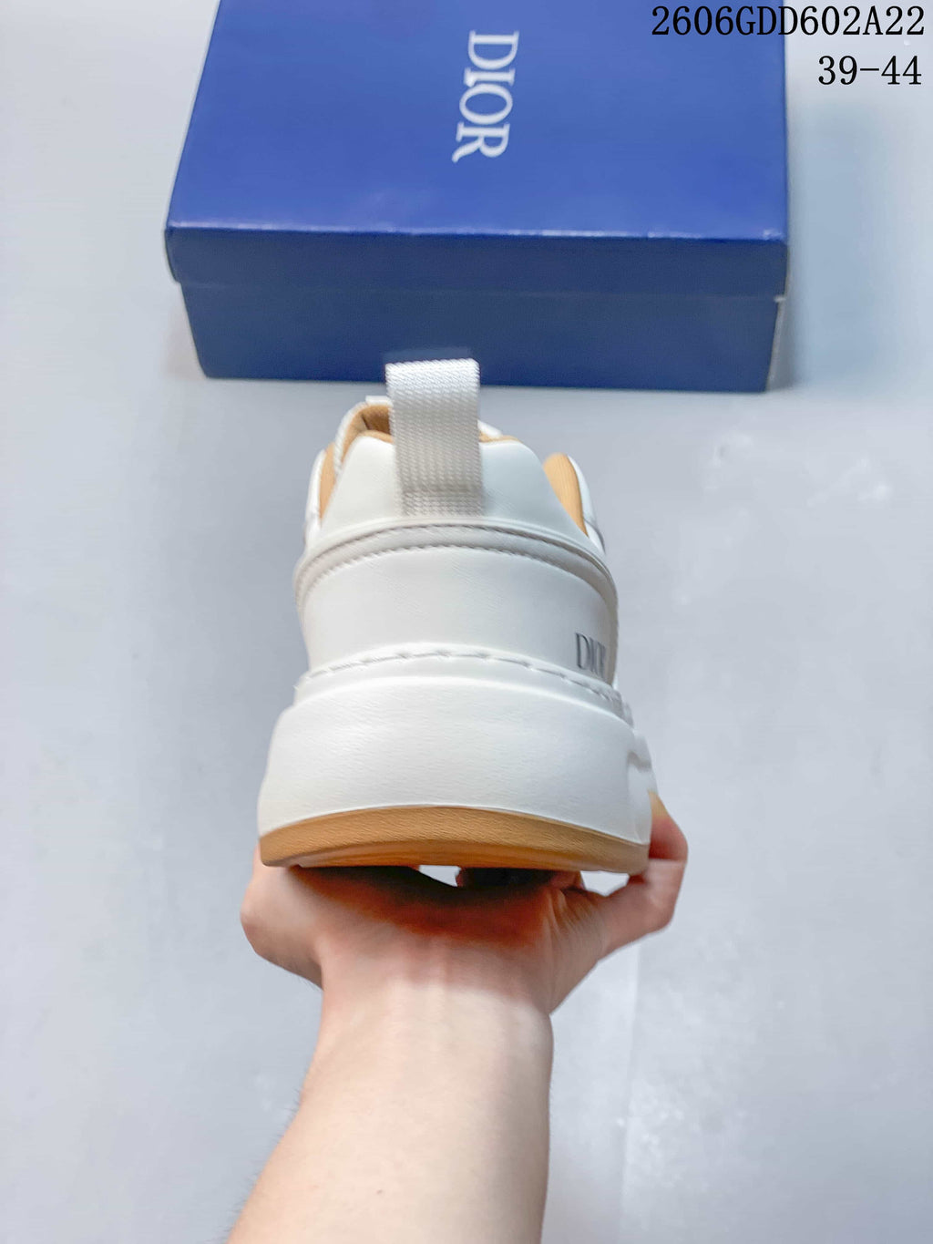Rear view showing the heel, pull tab, and thick sole