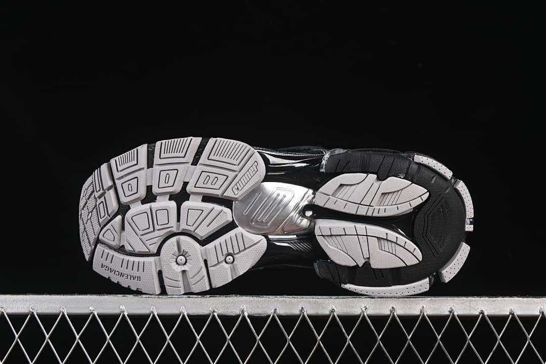 Underside view showing the segmented black and light-colored outsole.