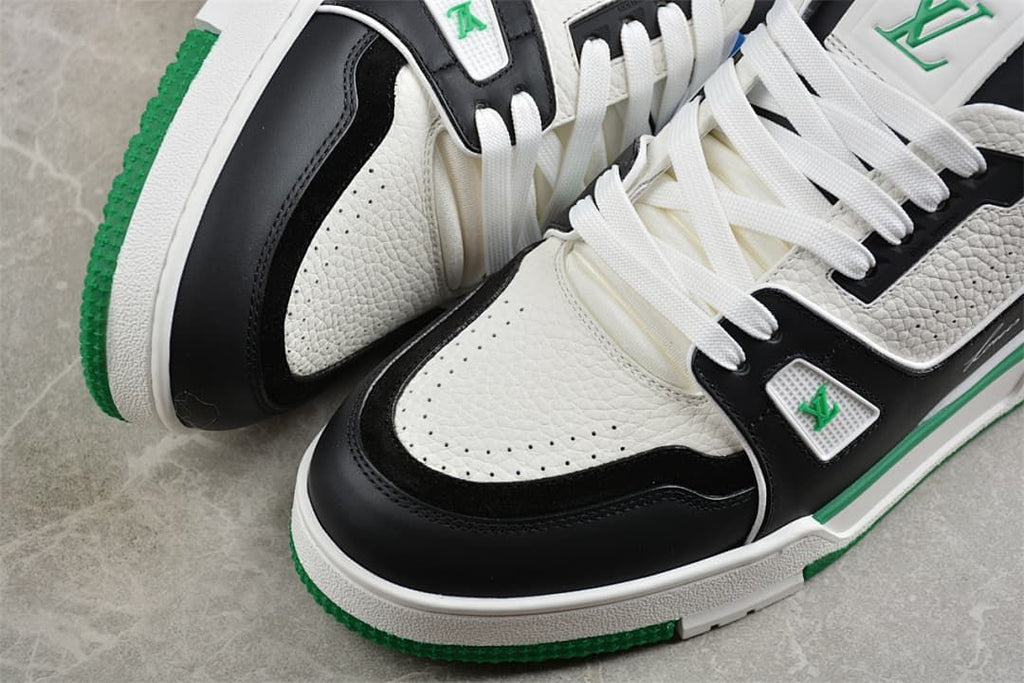 Close-up of the sneaker toe with perforations and black overlays.