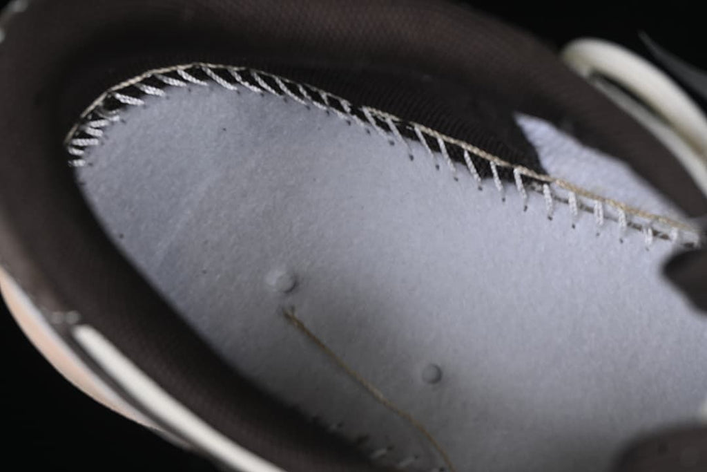 Close-up of interior stitching and shoe construction