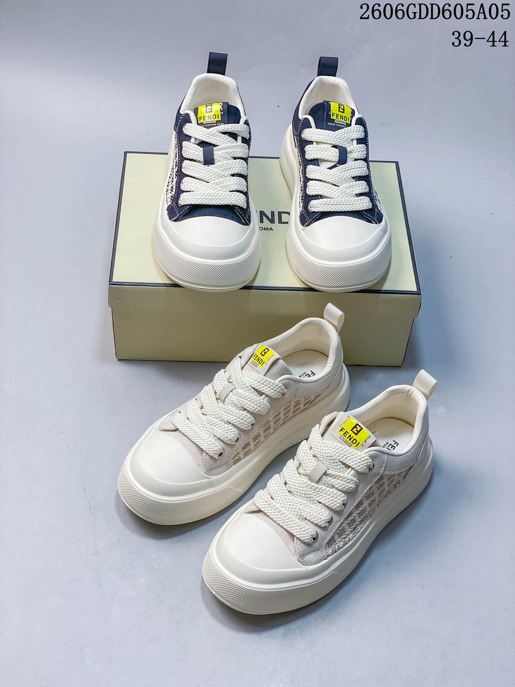 Navy and light neutral pairs of patterned low-top lace-up sneakers