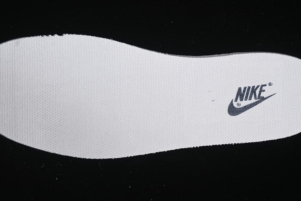 Close-up of the white insole with Nike branding.