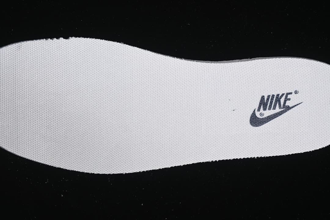 Close-up of the white insole with Nike branding.