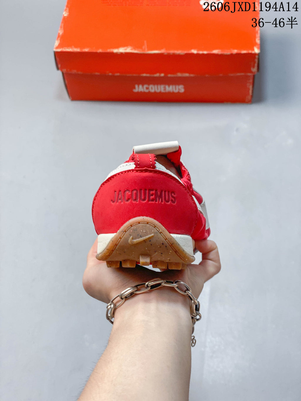 Rear view showing the red heel panel and branded details
