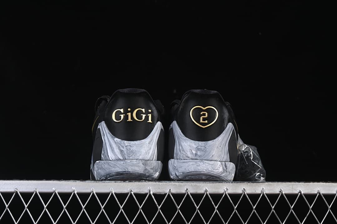 Rear view of the pair with gold GiGi and heart details