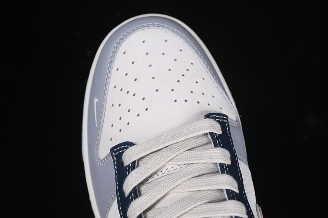 Top-down view of perforated toe and laces