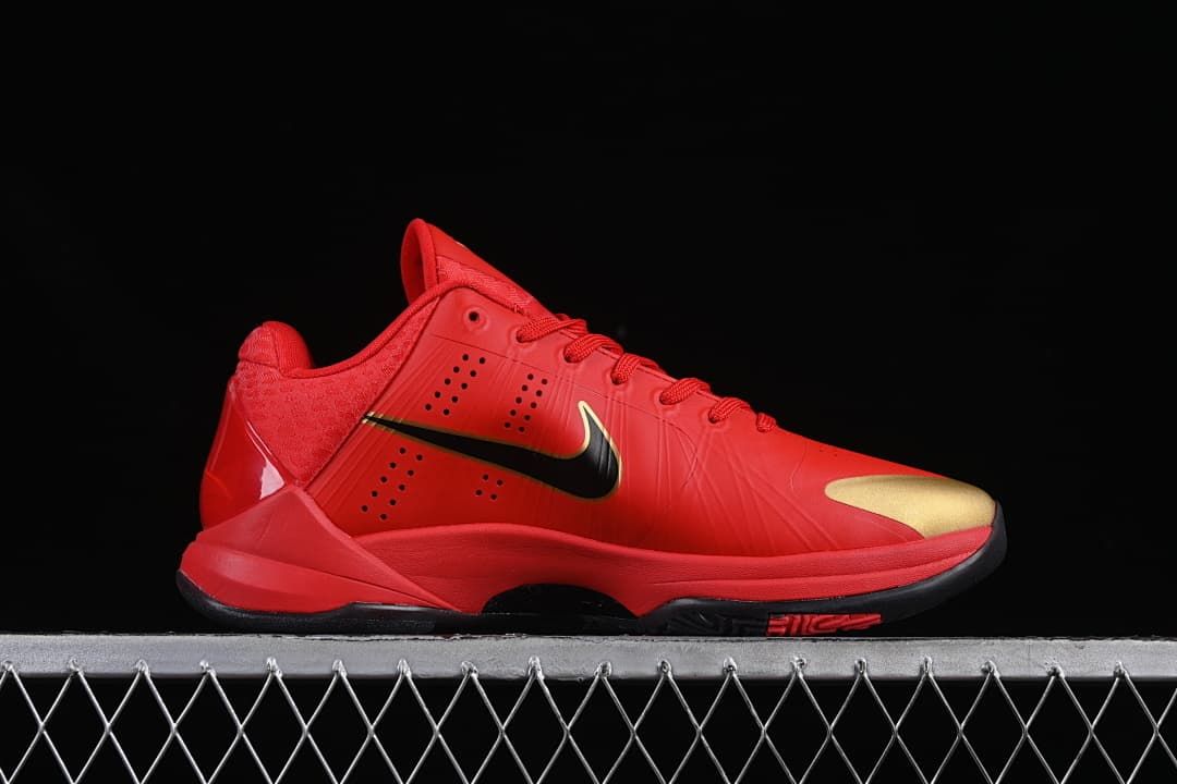 Side view showing black side logo and gold toe accent