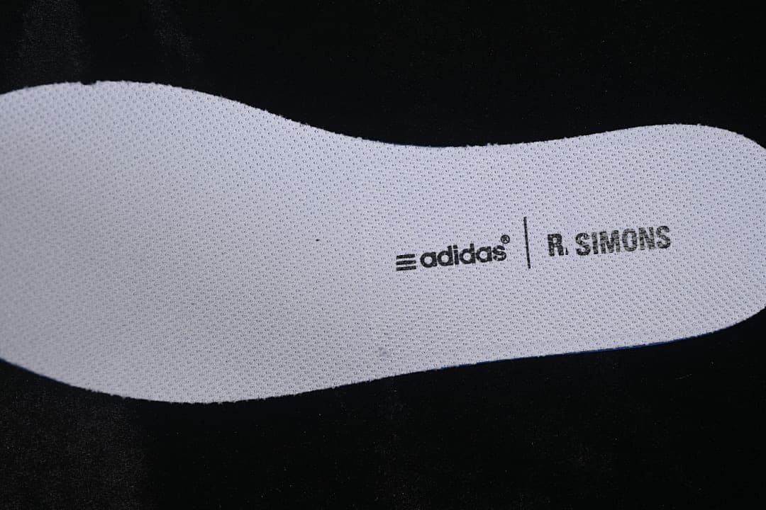 White insole with adidas and R. Simons branding