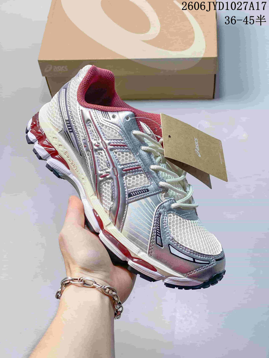 Dark navy and silver ASICS GEL-KAYANO 12.1 sneaker with mesh panels