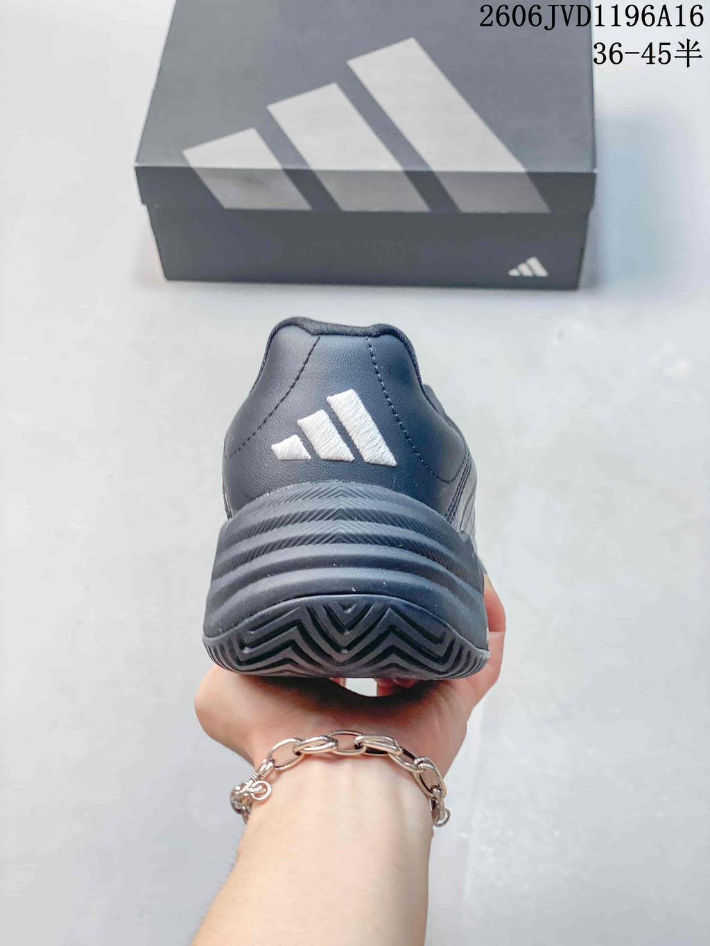 Rear view showing the heel branding and outsole tread