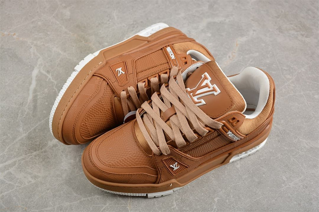 Pair of brown low-top sneakers shown from above at an angle.
