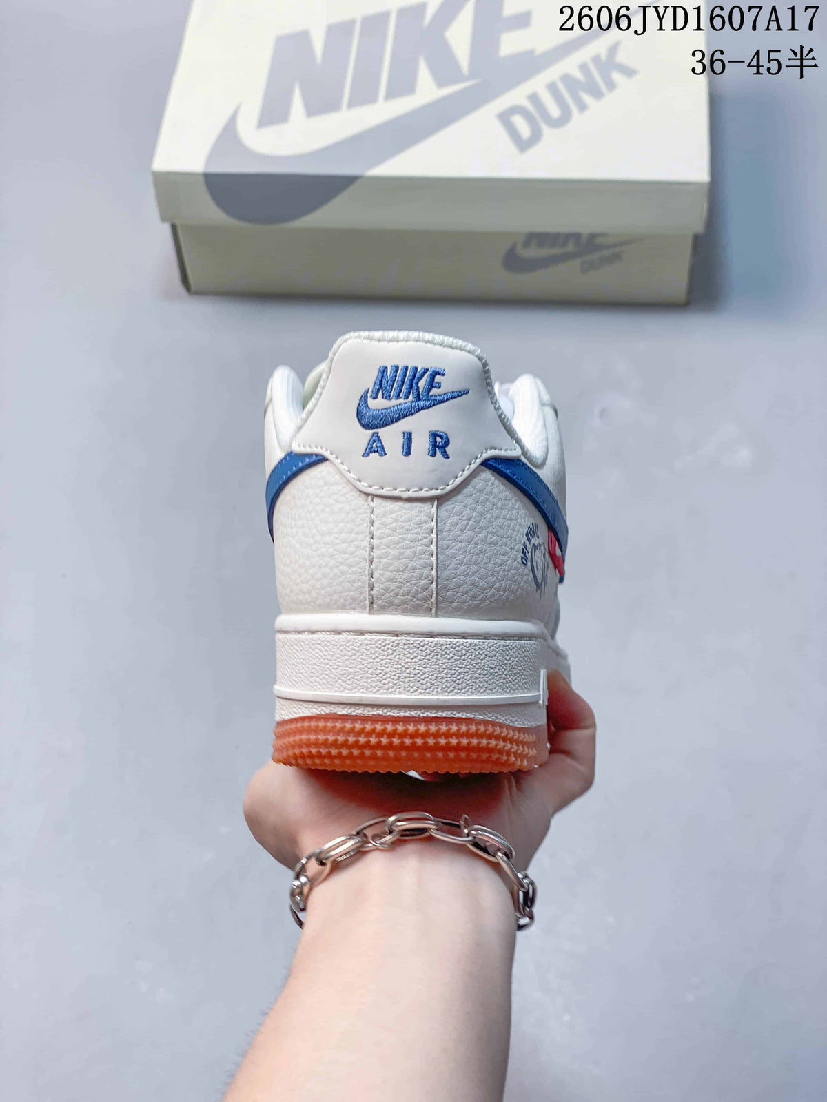 Rear view showing the white heel, blue details and gum outsole