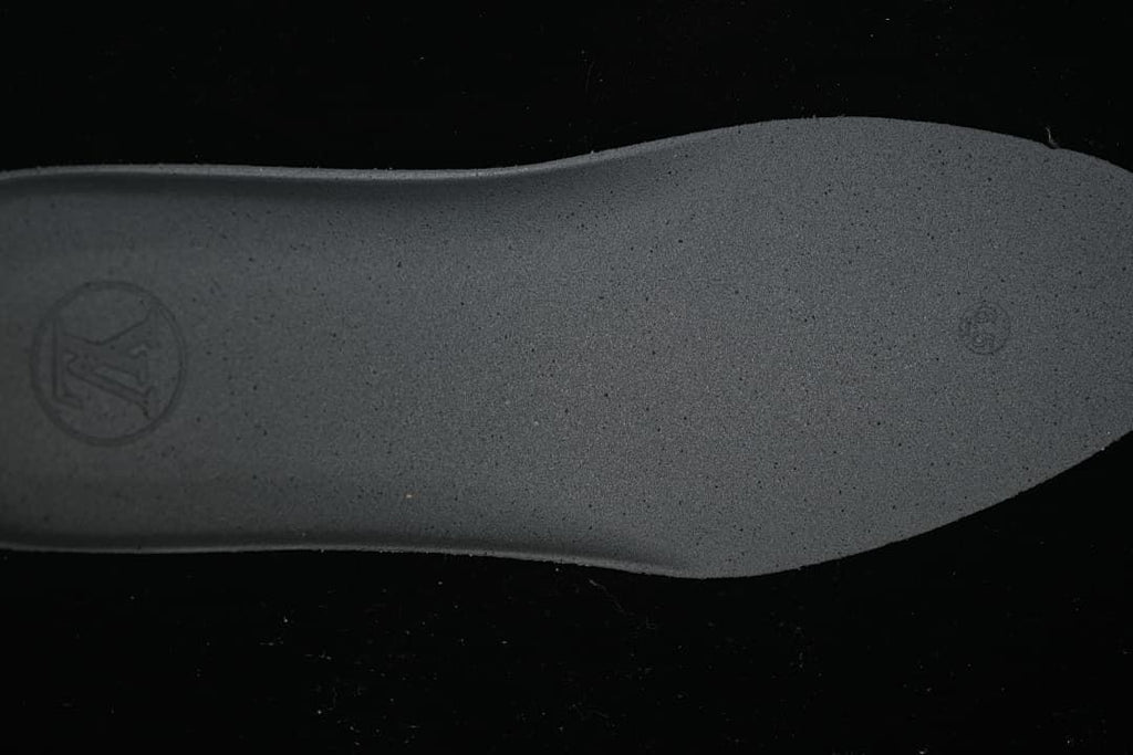 Close-up view of the dark textured shoe insert
