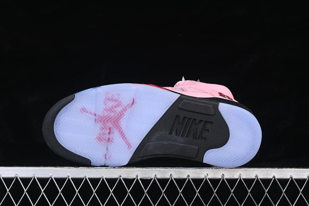 Outsole view showing translucent sections, a black center, and Nike branding.