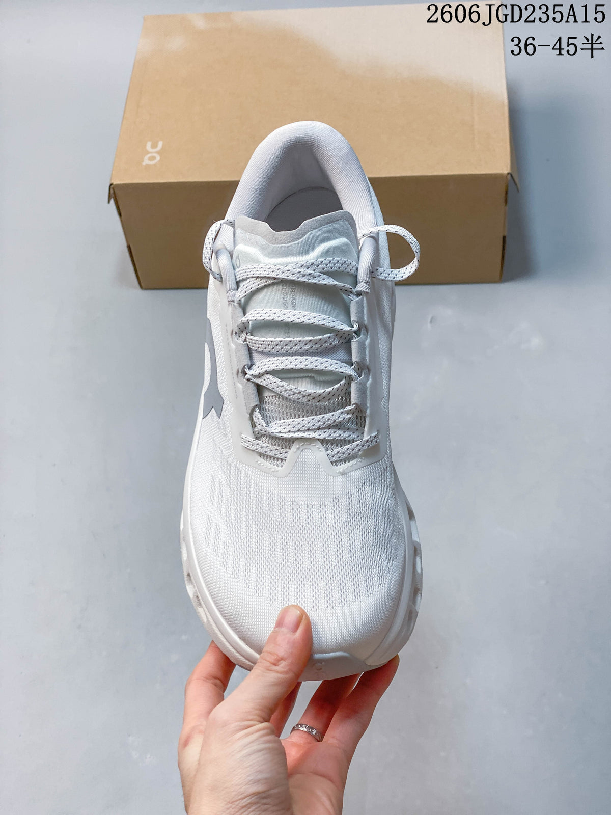 Top view of the white On Cloudmonster 3 sneaker with patterned laces