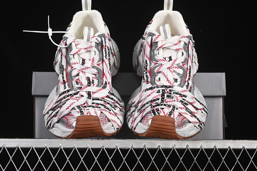 Front view of the pair with layered logo-patterned laces