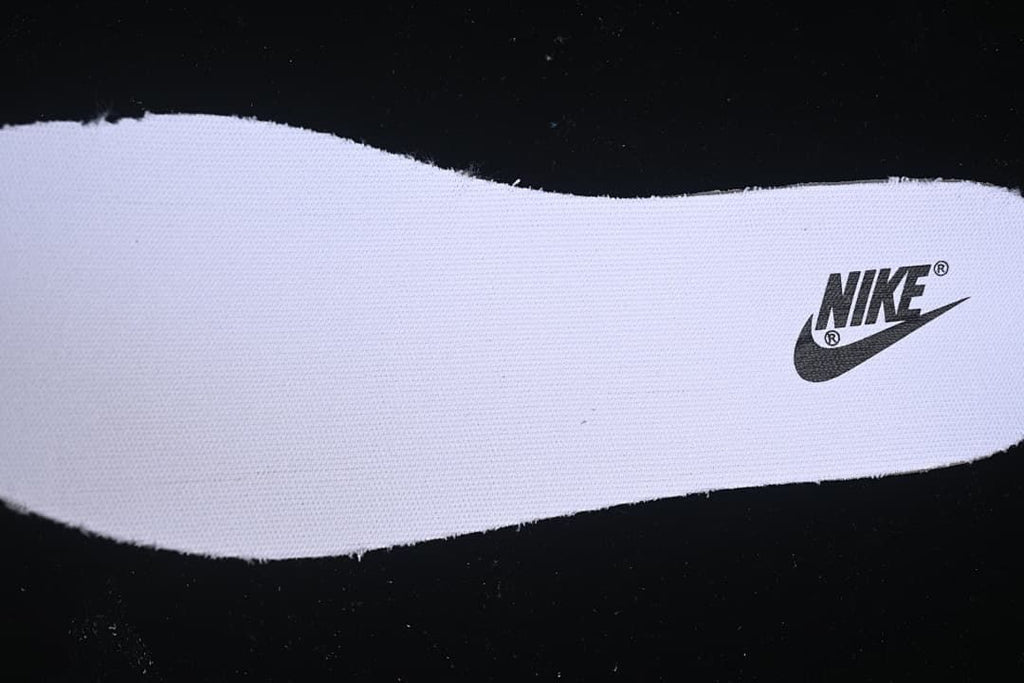 Close-up of a white insole with a Nike logo