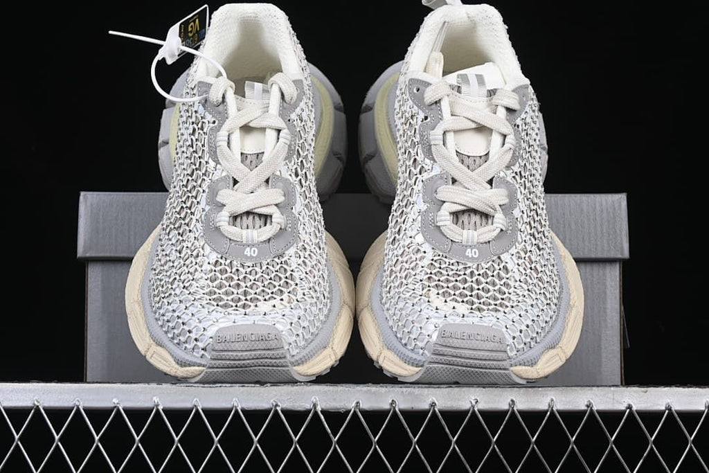 Front view of the pair showing the openwork uppers and laces