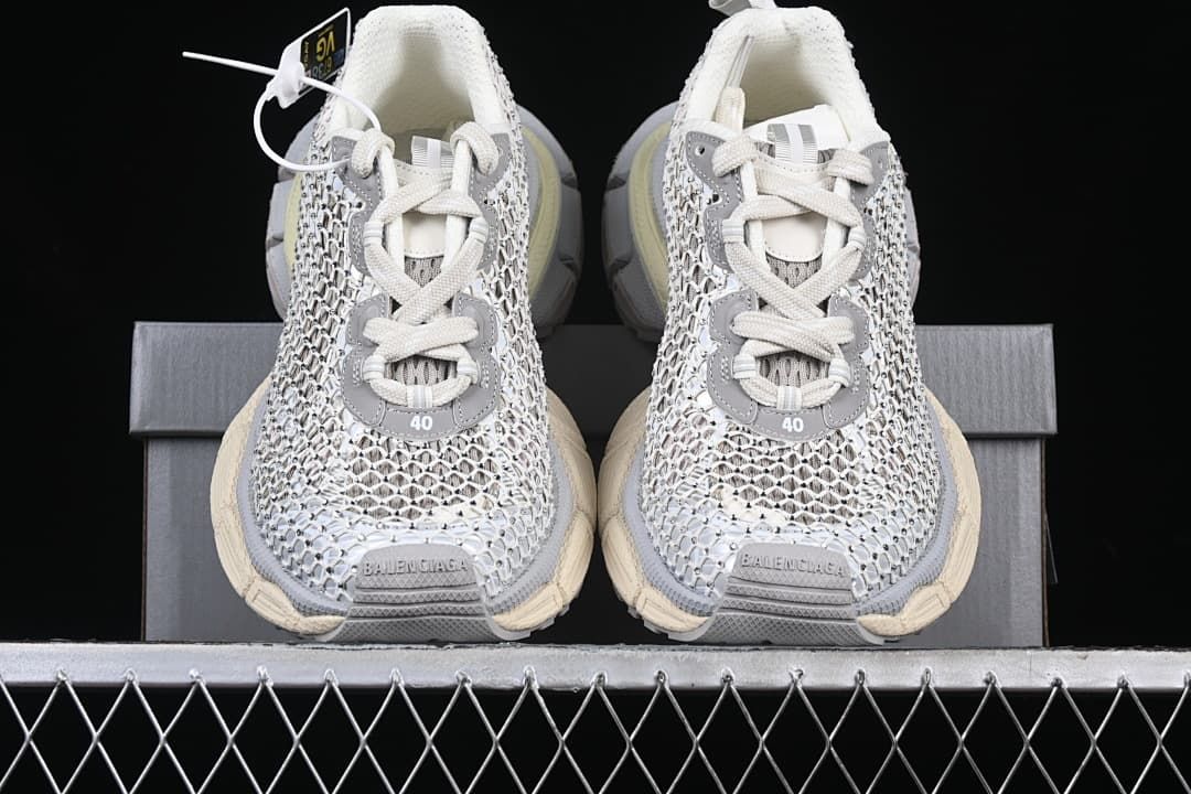 Front view of the pair showing the openwork uppers and laces