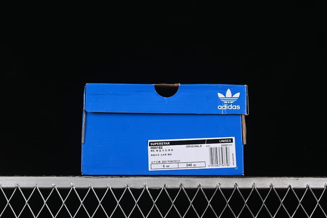 Blue adidas shoe box with Superstar H00182 label