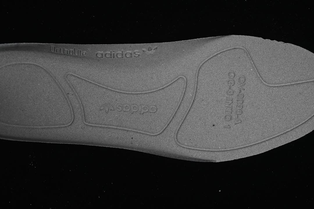 Close-up of the outsole with molded adidas branding