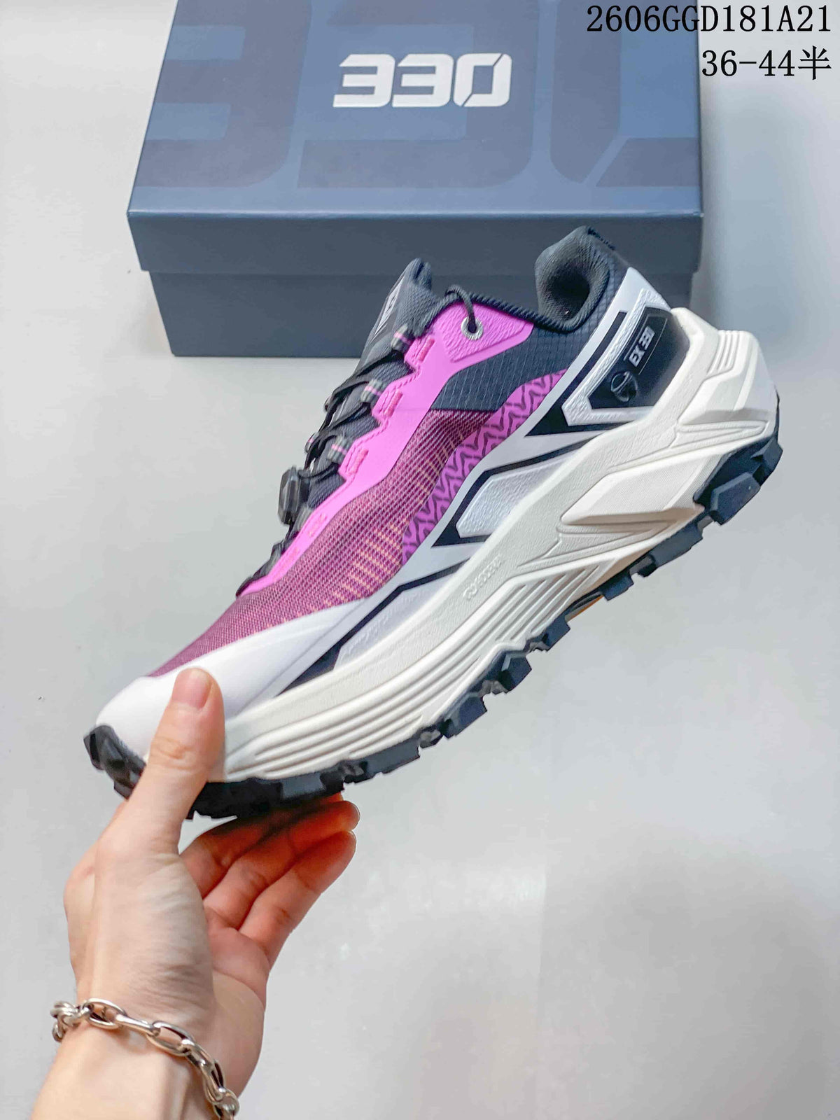 Side view of a pink, gray, and white Kailas FUGA EX BOA trail shoe