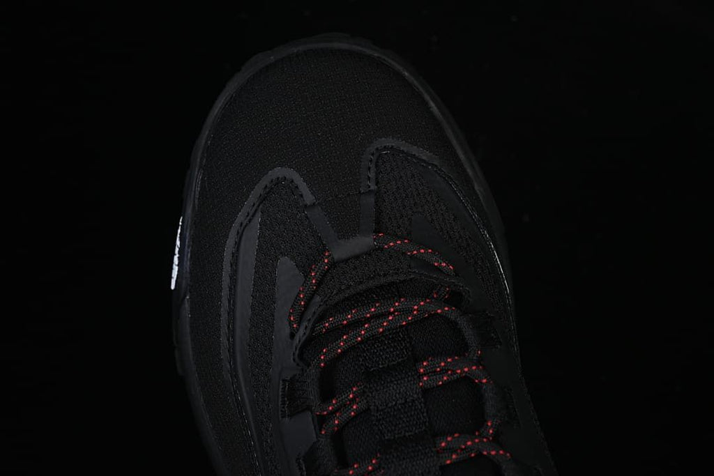 Top view of the shoe's rounded toe and lace area