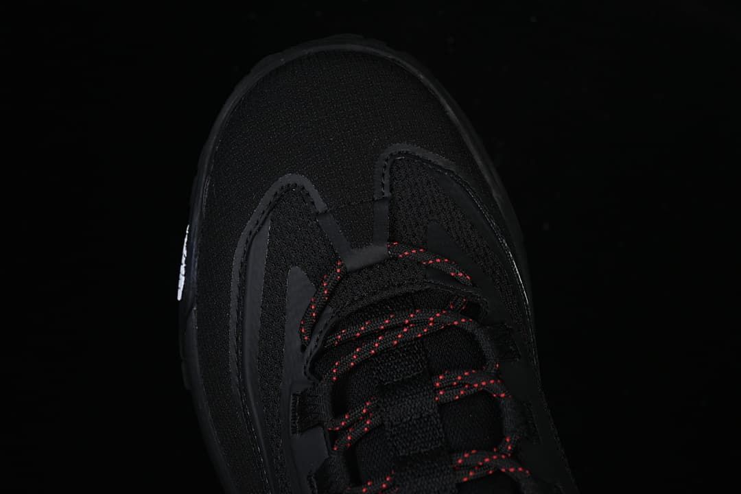 Top view of the shoe's rounded toe and lace area