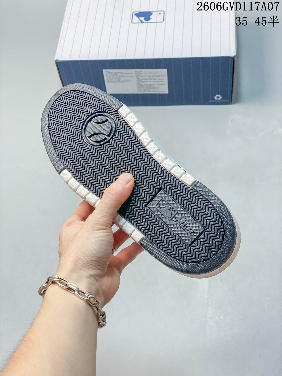 Close-up of the patterned outsole on a white MLB Chunky Liner sneaker