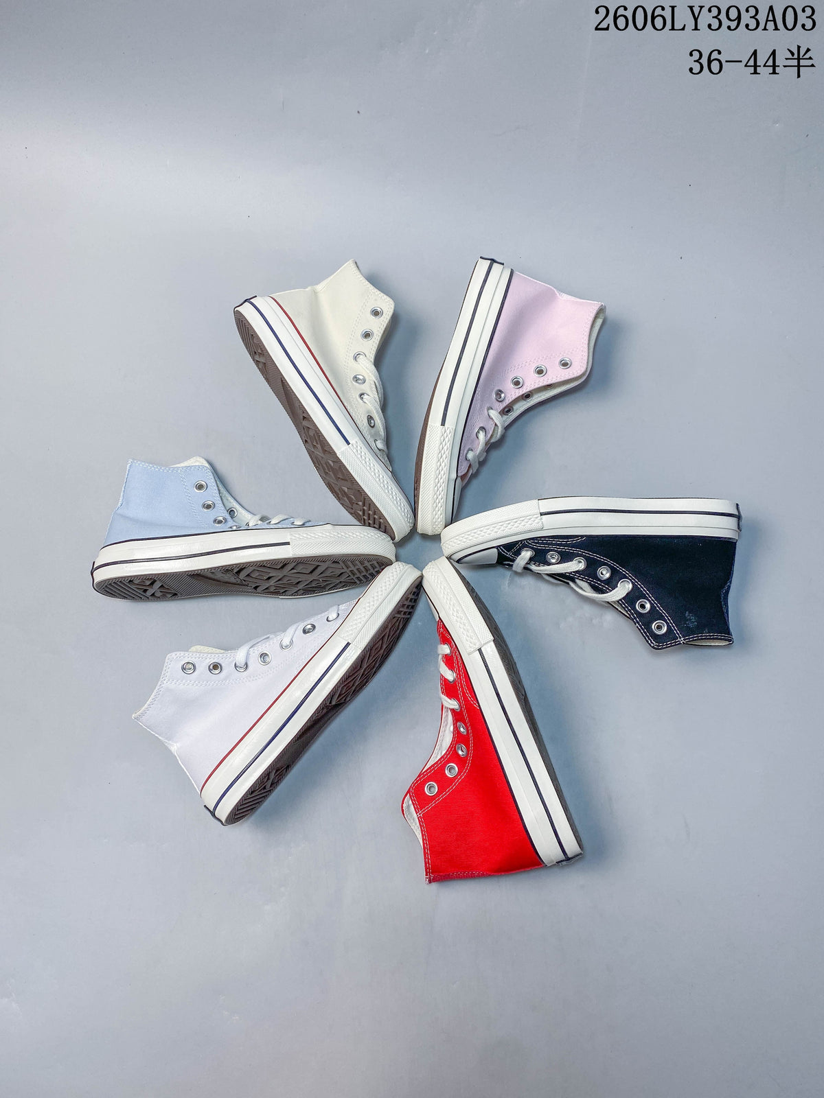 Six high-top sneakers in assorted colors arranged in a circle