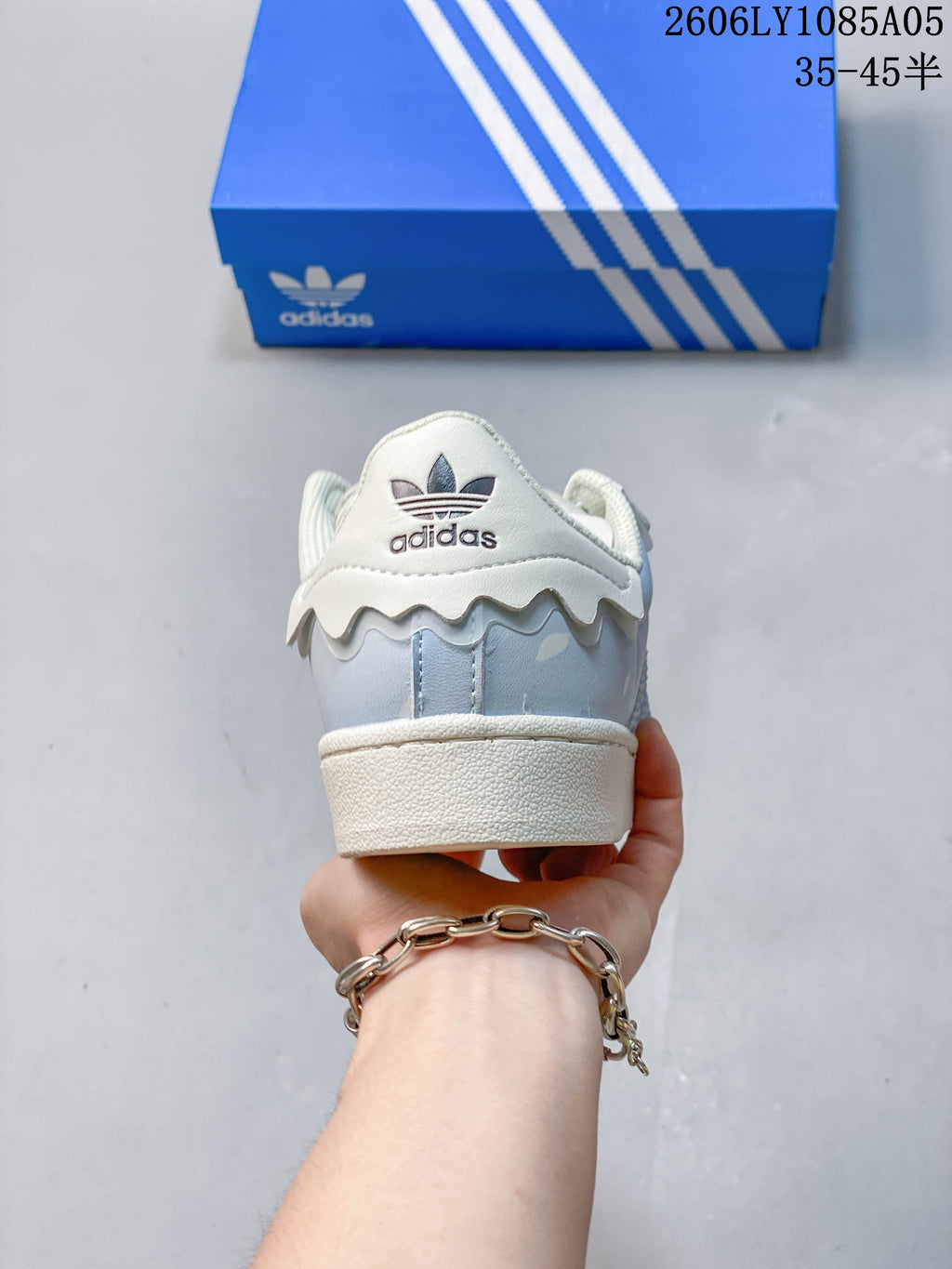 Rear view showing the layered heel detail and logo